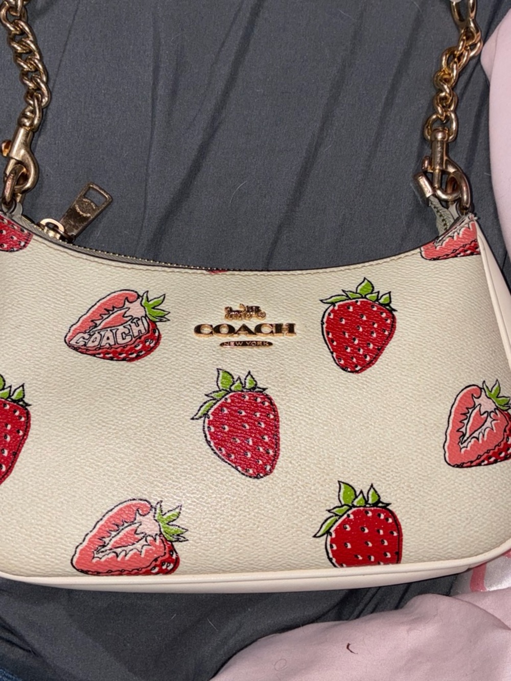 Limited edition strawberry coach purse and wallet.